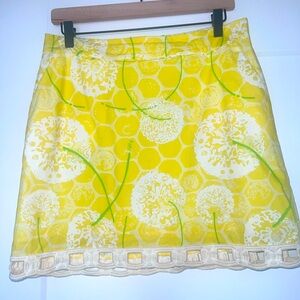LILLY PULITZER bright yellow Marti skirt with dandelions. Cutout hem detail Sz 6